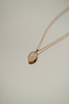 BOTANICAL DISK NECKLACE