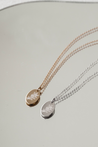 BOTANICAL DISK NECKLACE